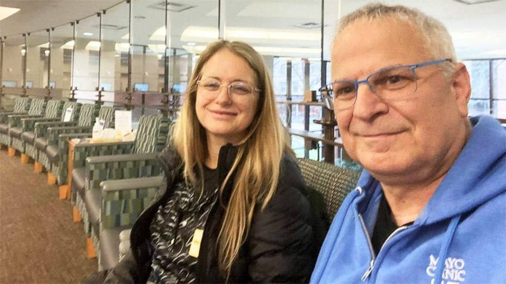 Yiftah Geva recalls how empty the waiting rooms were at Mayo Clinic in March. He and his wife, Sigal, wait to be called for an appointment a few days prior to surgery for hypertrophic cardiomyopathy.